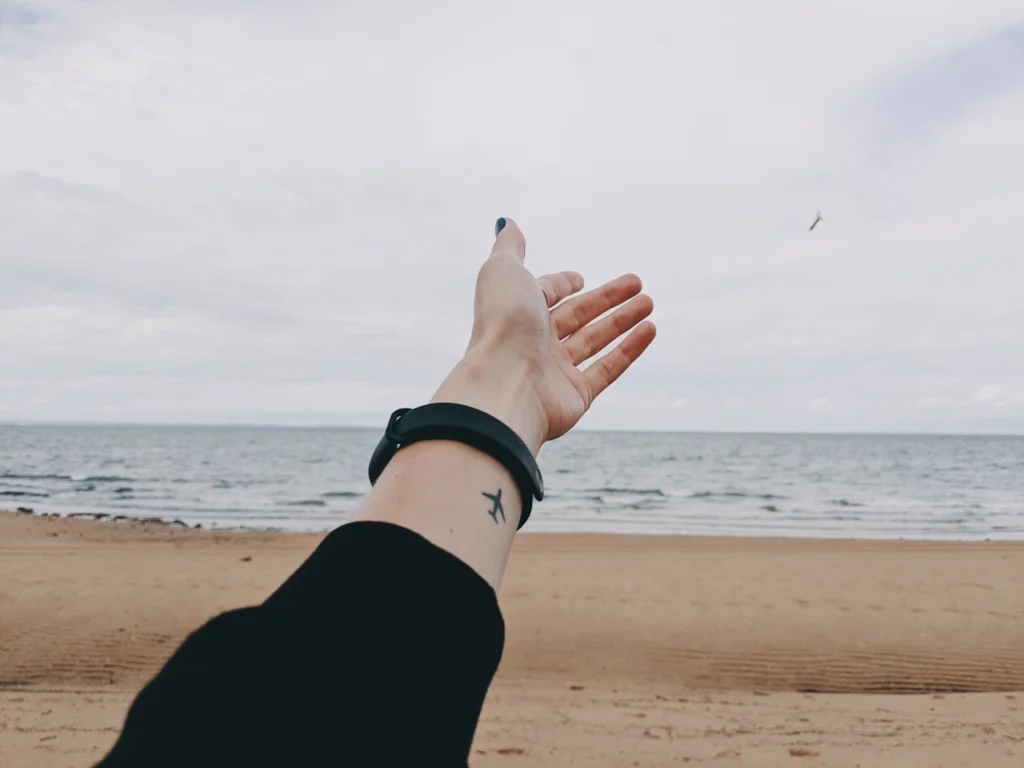 minimalist small travel tattoos 